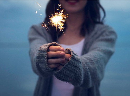 young-woman-sparkler.jpg